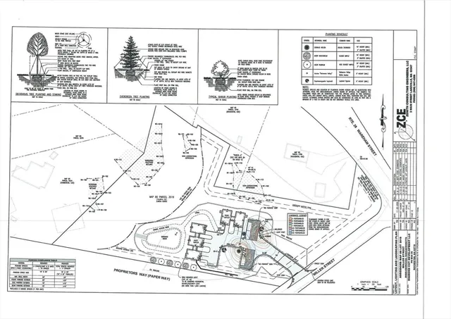 a bathroom with a double vanity sink and mirror