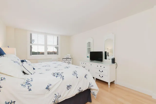 a bathroom with a sink a vanity and a mirror