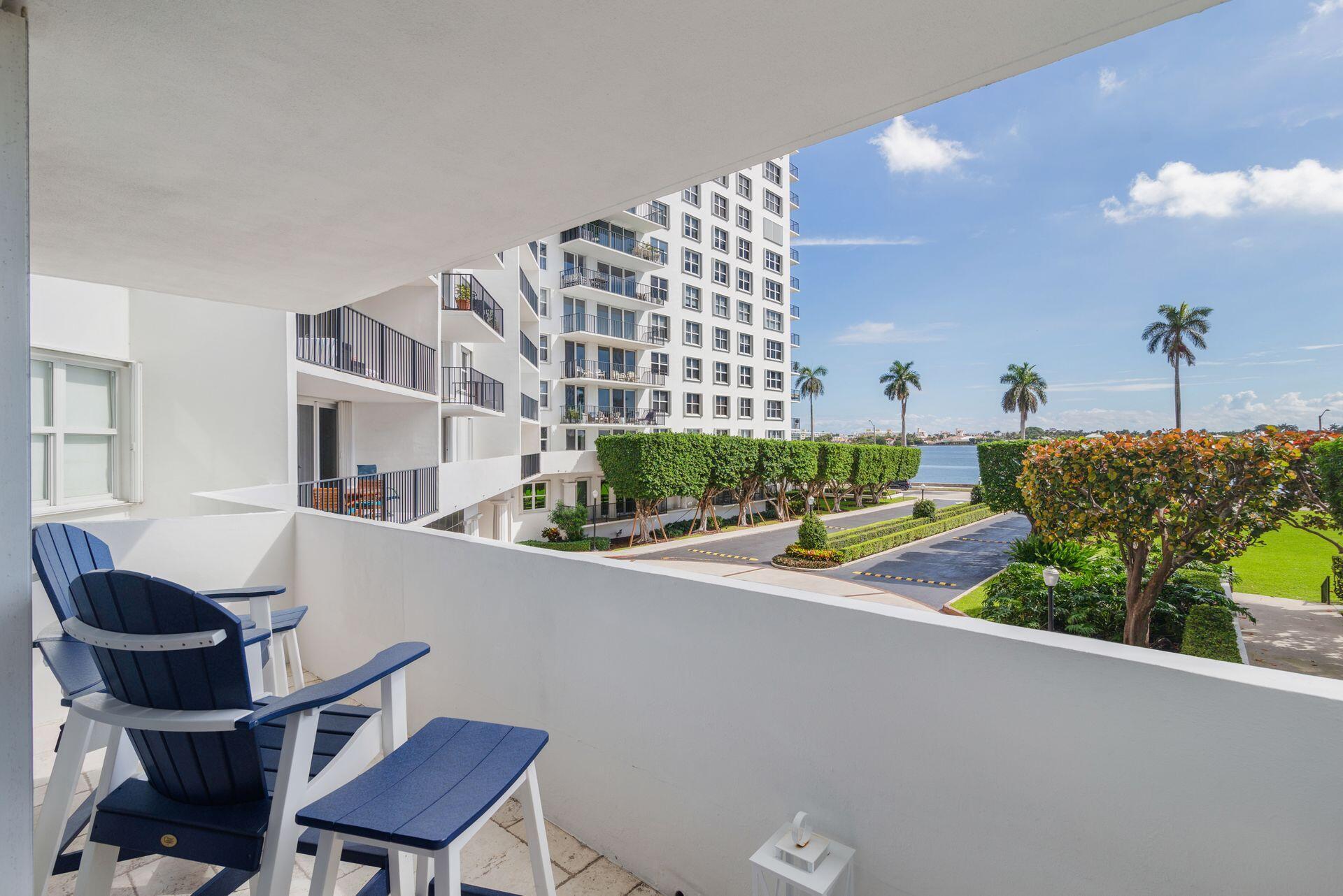 1701 South Flagler Drive, Unit 207 West Palm Beach, FL 33401 - Photo 19 of 26 a living room with furniture and a potted plant