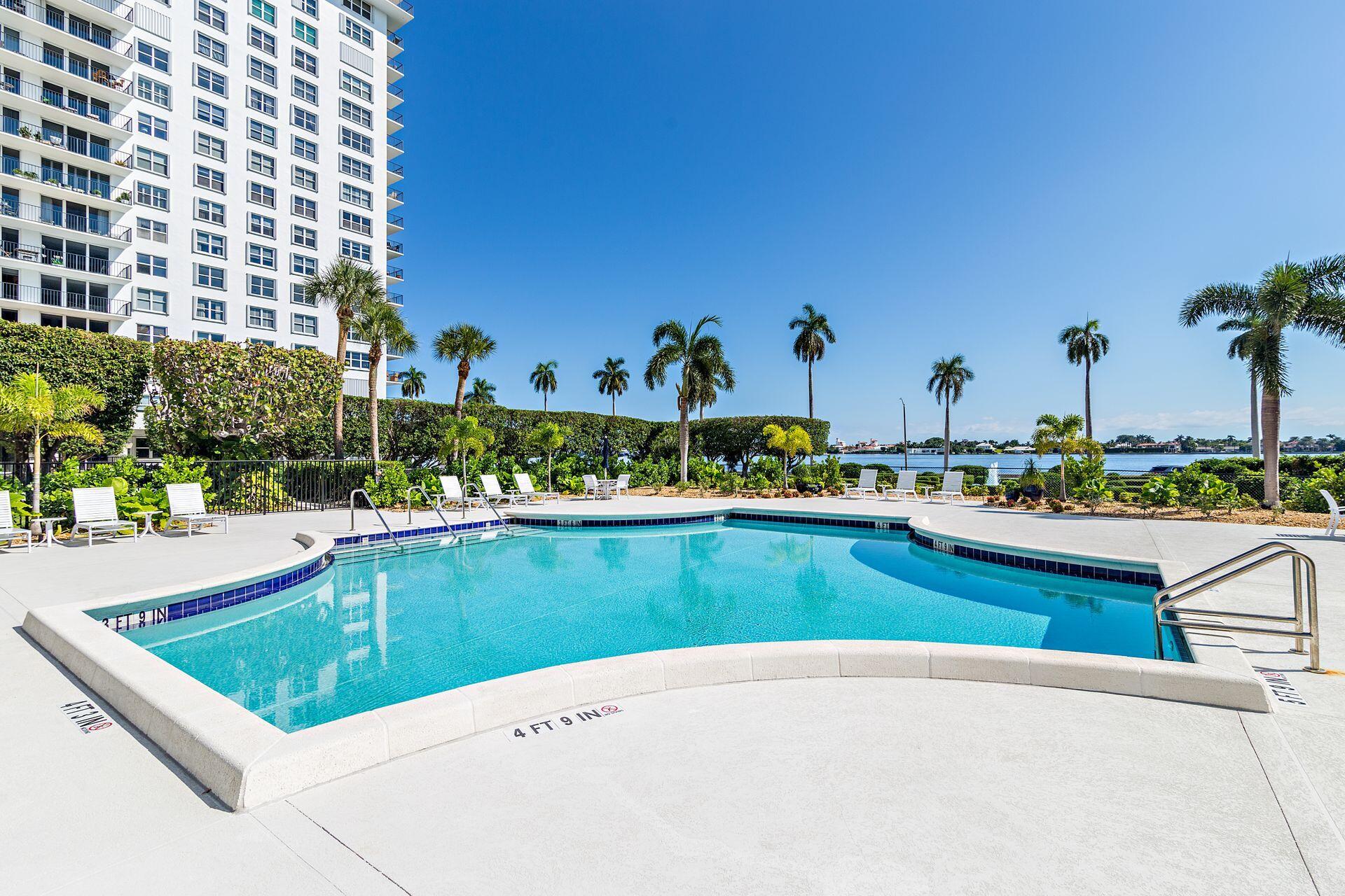 1701 South Flagler Drive, Unit 207 West Palm Beach, FL 33401 - Photo 21 of 26 a view of a swimming pool and outdoor space
