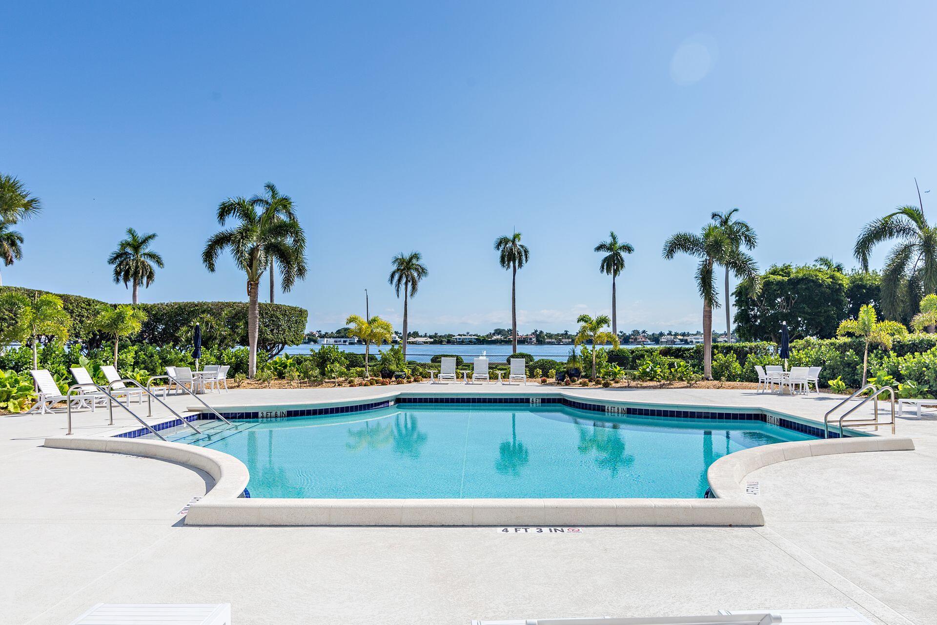1701 South Flagler Drive, Unit 207 West Palm Beach, FL 33401 - Photo 22 of 26 a room with a table and chairs