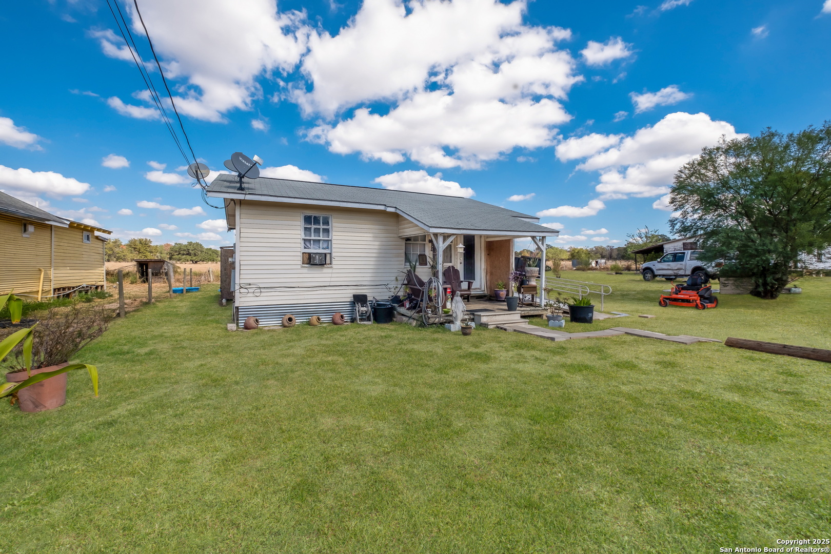 1231 Mogford Road San Antonio, TX 78264 - Photo 1 of 32 a view of a yard in front of the house
