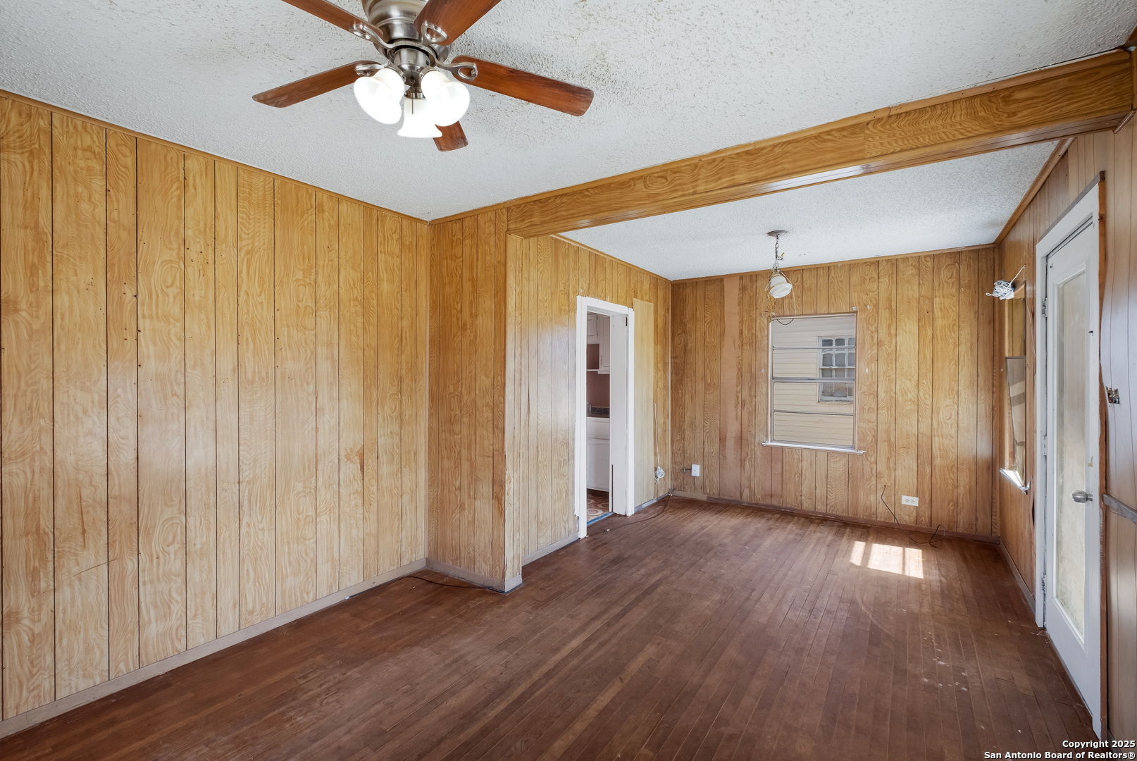 1231 Mogford Road San Antonio, TX 78264 - Photo 17 of 32 a view of livingroom with hardwood floor and ceiling fan