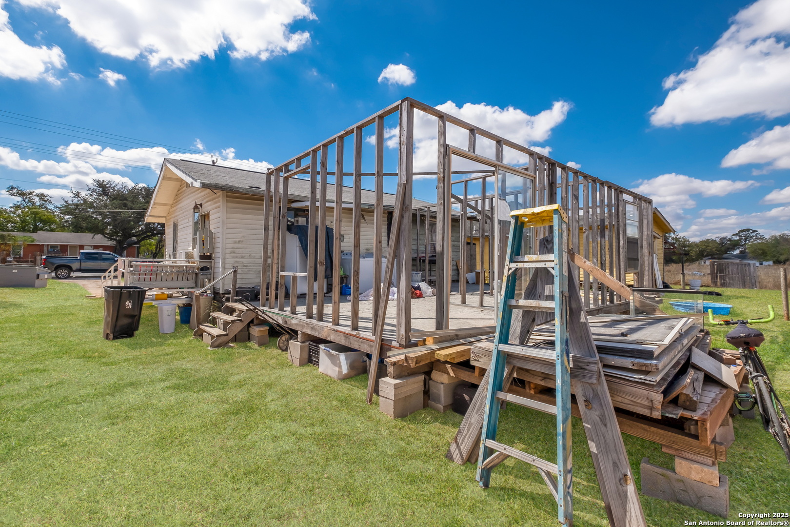 1231 Mogford Road San Antonio, TX 78264 - Photo 3 of 32 a view of a chairs and tables in the back yard of the house