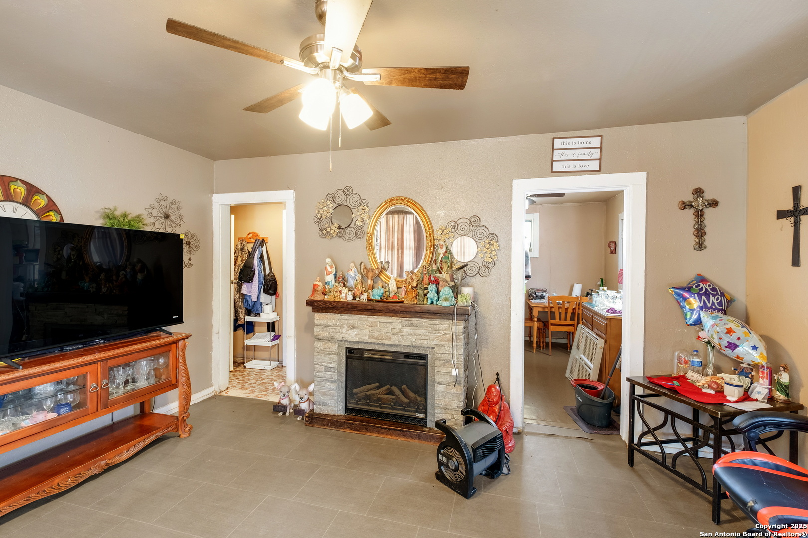 1231 Mogford Road San Antonio, TX 78264 - Photo 5 of 32 a living room with furniture and a flat screen tv