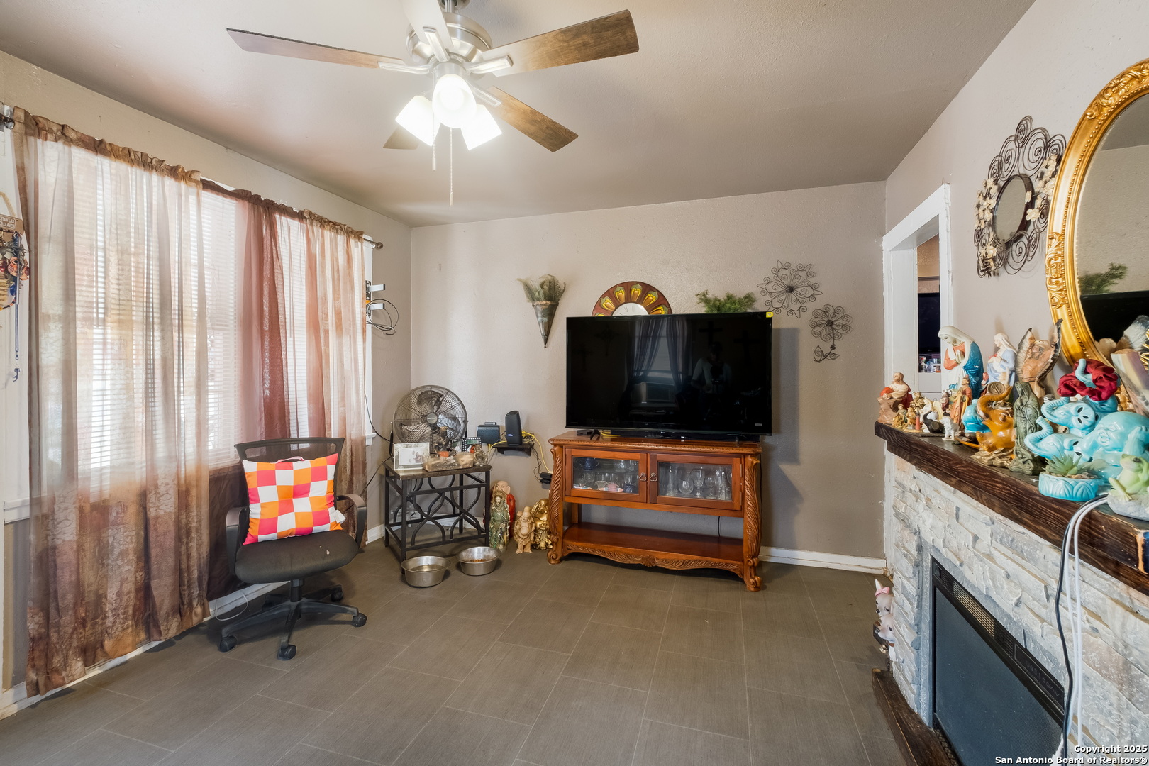 1231 Mogford Road San Antonio, TX 78264 - Photo 6 of 32 a living room with furniture and a flat screen tv