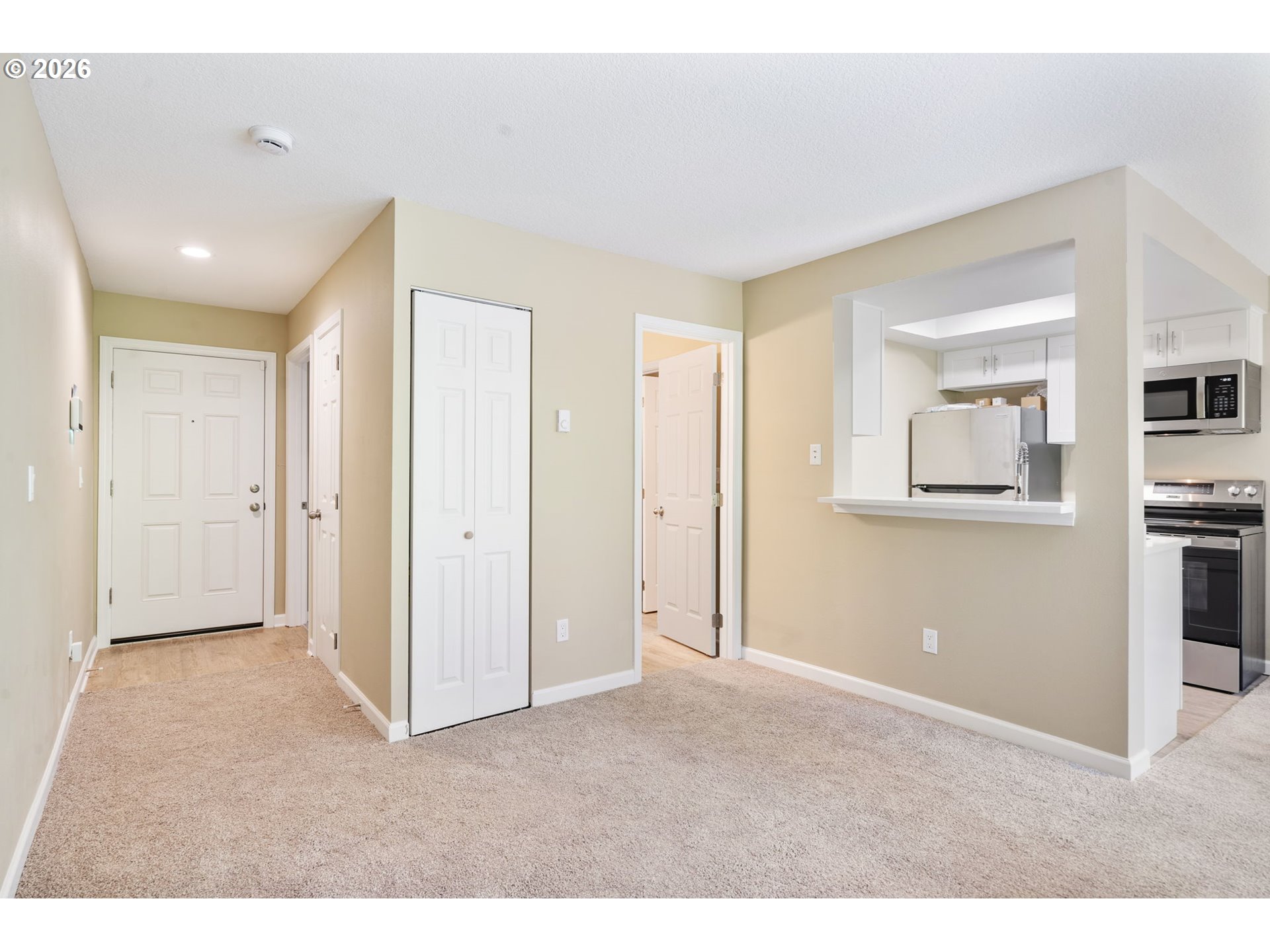 9967 Southeast Talbert Street Clackamas, OR 97015 - Photo 8 of 33 a big room with closet and windows