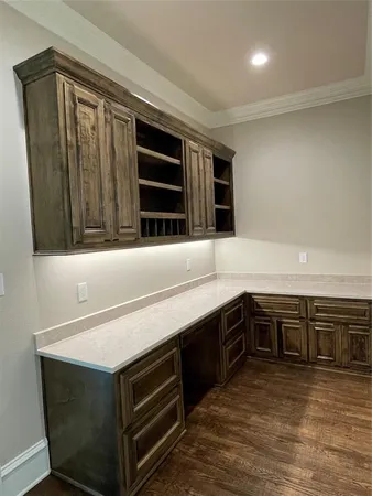 a kitchen with stainless steel appliances a stove and a sink