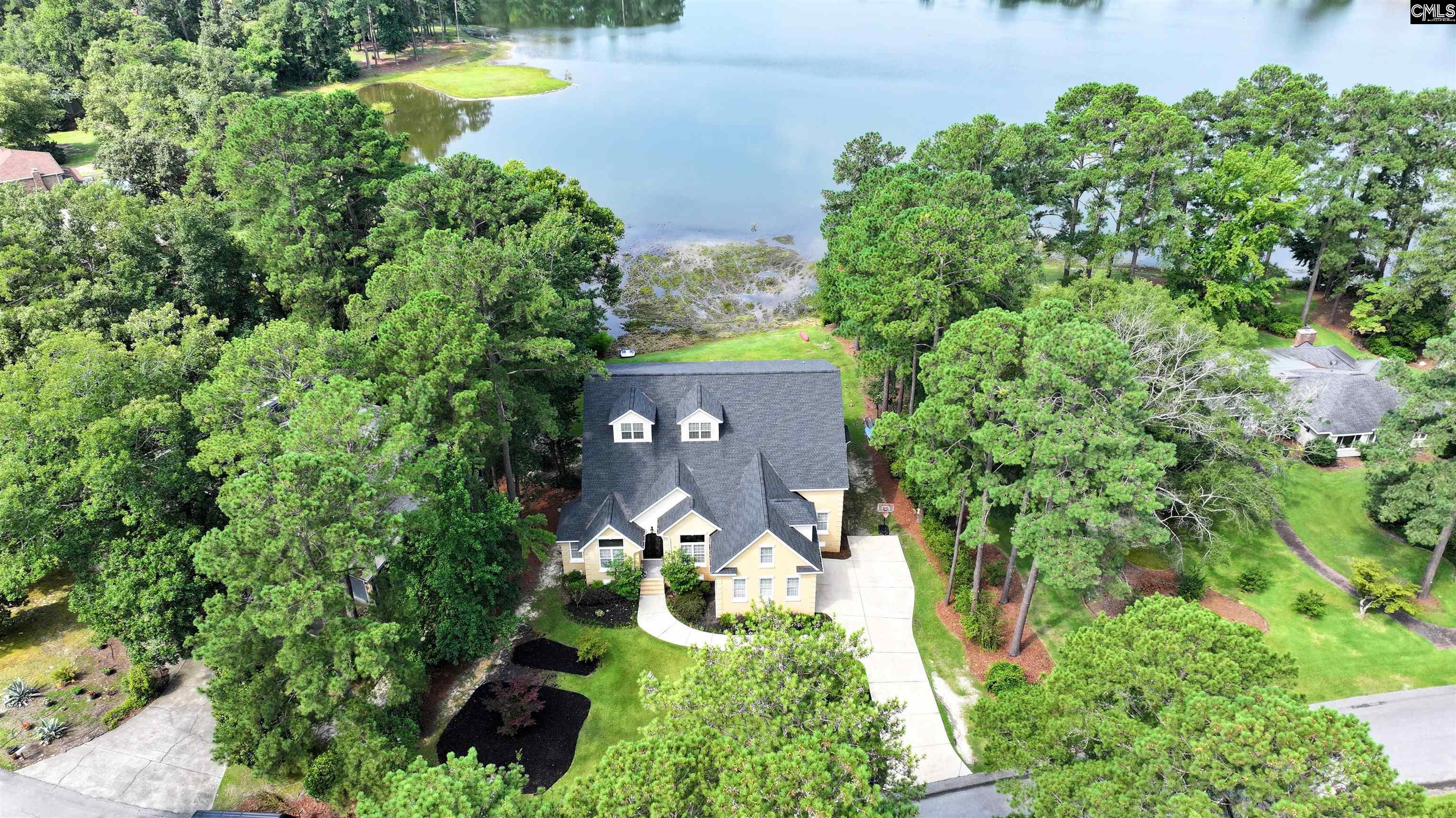 305 Northlake Road Columbia, SC 29223 - Photo 43 of 46 an aerial view of a house with a yard and lake view
