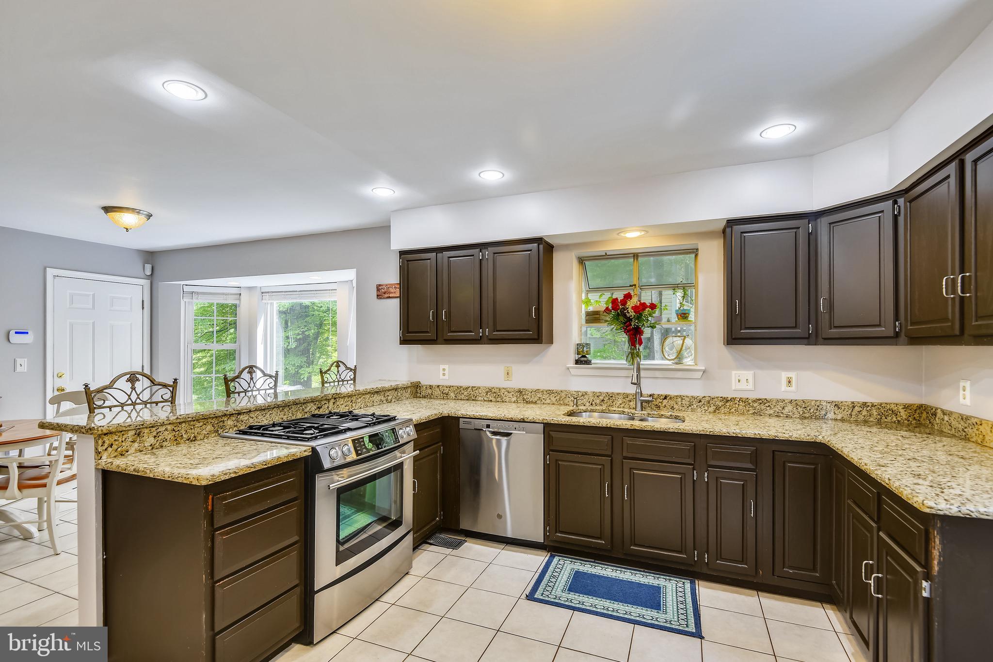73 Sheridan Road Arnold, MD 21012 - Photo 11 of 35 Tons of counter space on these granite counters.