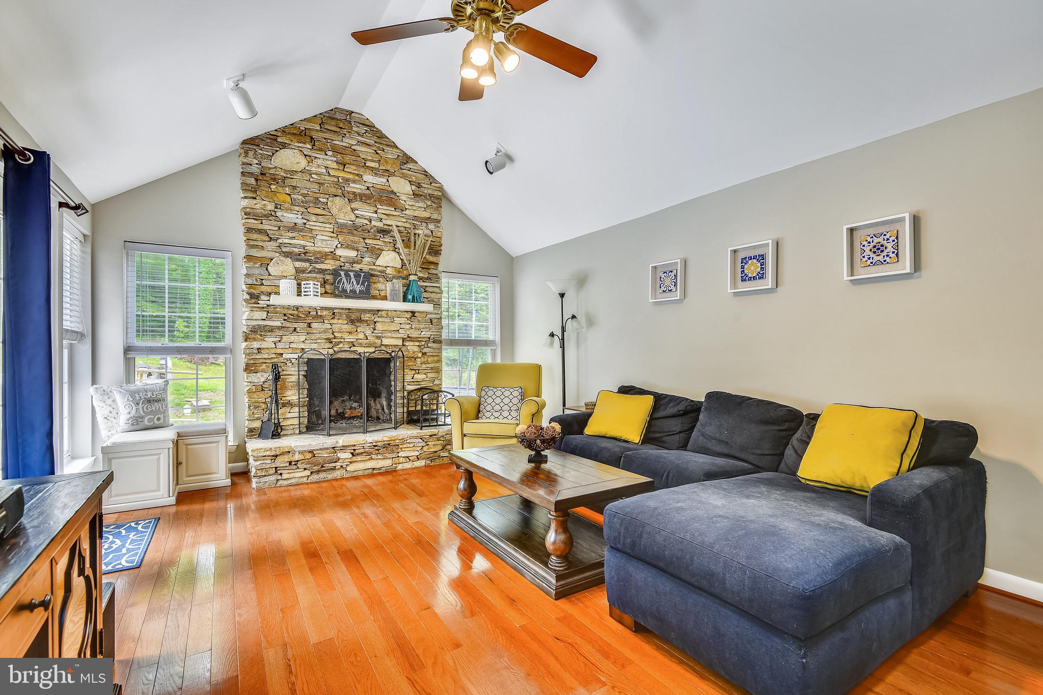 73 Sheridan Road Arnold, MD 21012 - Photo 6 of 35 Gorgeous stacked stone wood burning fireplace.