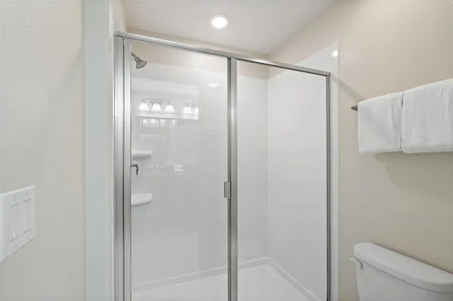 a view of swimming pool with outdoor seating