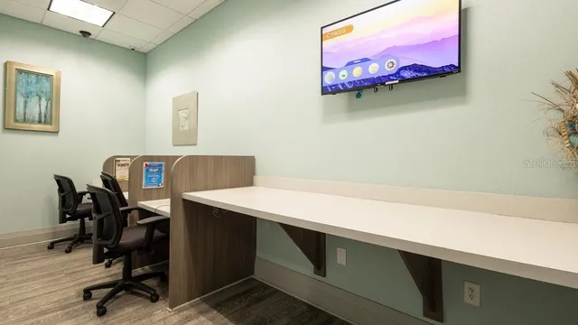 a view of a lake with a building in the background
