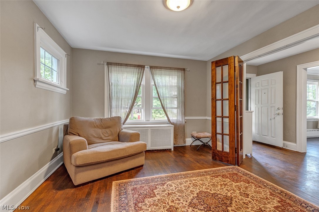 2972 Yorkshire Road Cleveland Heights, OH 44118 - Photo 18 of 44 Hardwood flooring, crown molding, and chair rail detailing