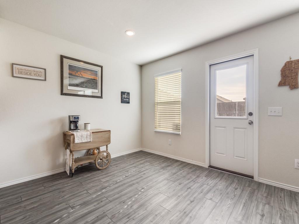 16033 Pemberly Lane Haslet, TX 76052 - Photo 15 of 27 a view of a livingroom with workspace and a window