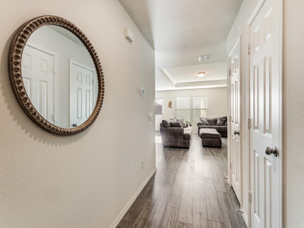 16033 Pemberly Lane Haslet, TX 76052 - Photo 5 of 27 an entryway view with sitting space and a view of living room