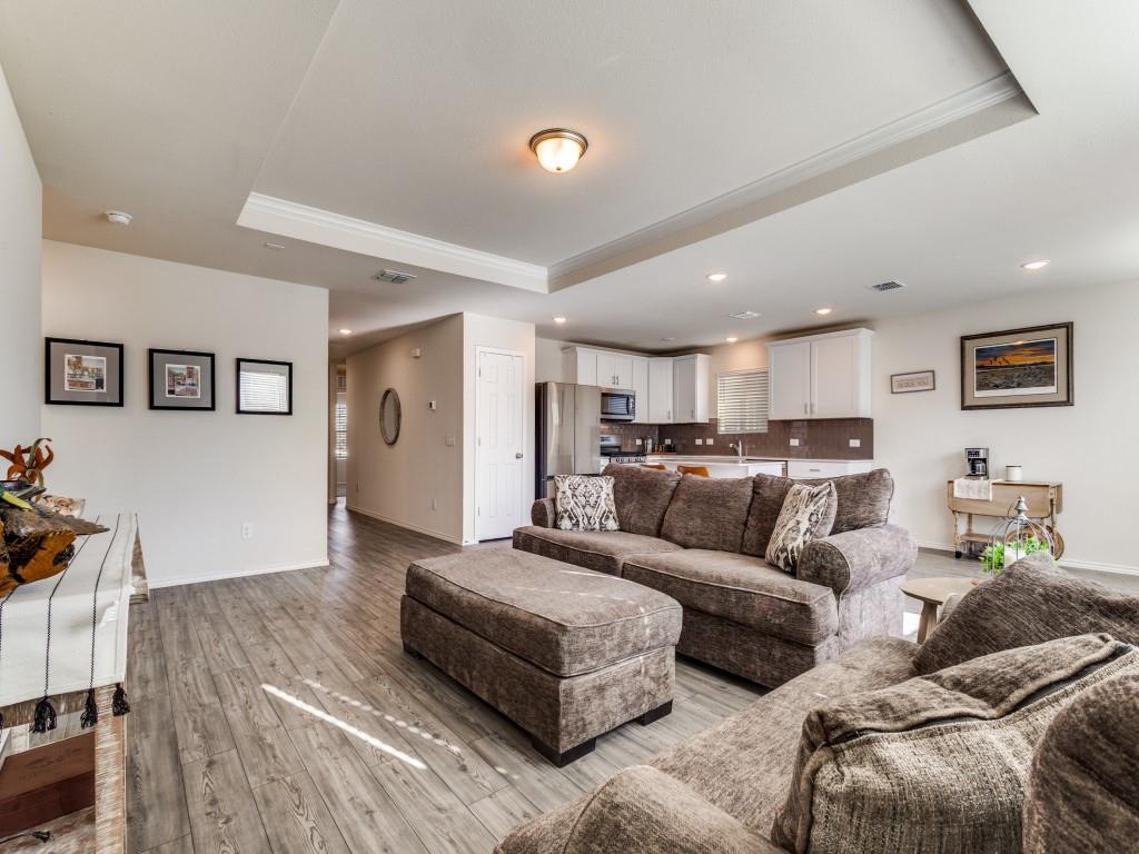16033 Pemberly Lane Haslet, TX 76052 - Photo 8 of 27 a living room with furniture and a view of kitchen