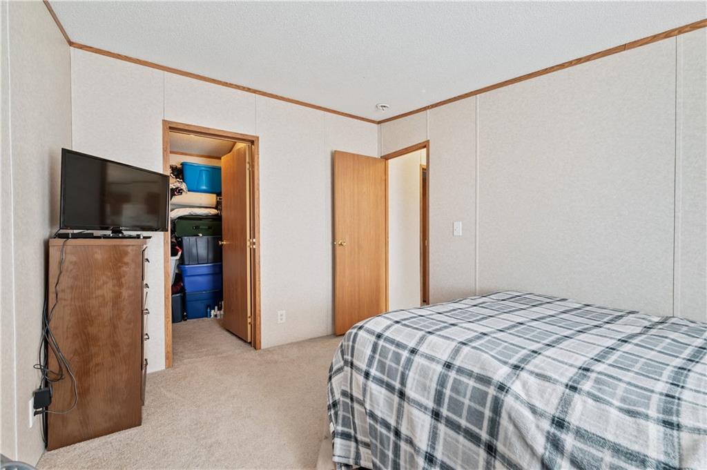 619 Deana Way Rochester, PA 15074 - Photo 18 of 29 This bedroom provides a thoughtful layout and boasts a large walk-in closet...that offers ample storage space.