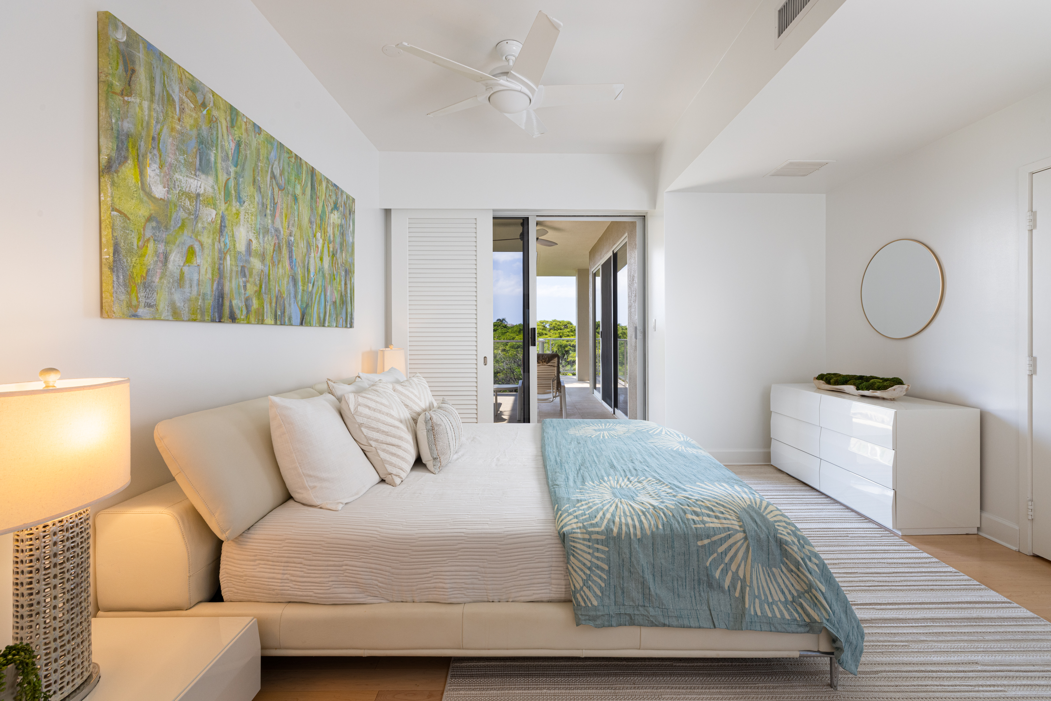 69-1010 Keana Place, Unit C202 Waikoloa, HI 96738 - Photo 15 of 30 a bedroom with a bed and window