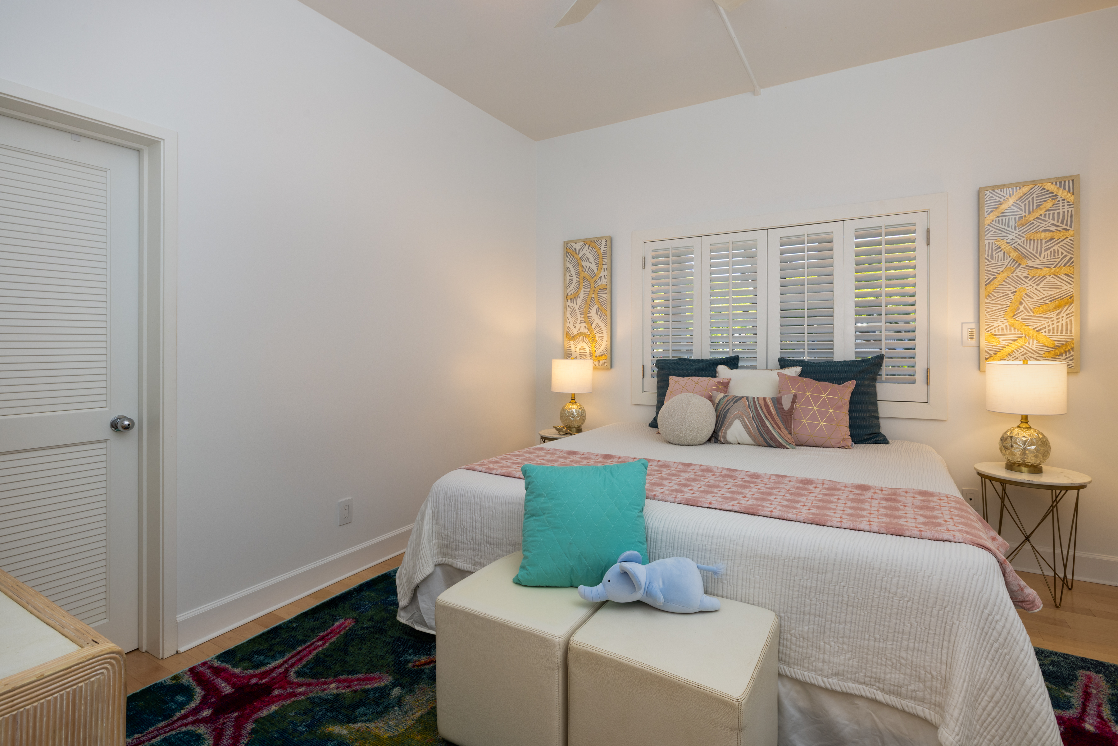 69-1010 Keana Place, Unit C202 Waikoloa, HI 96738 - Photo 22 of 30 a bedroom with furniture and a window