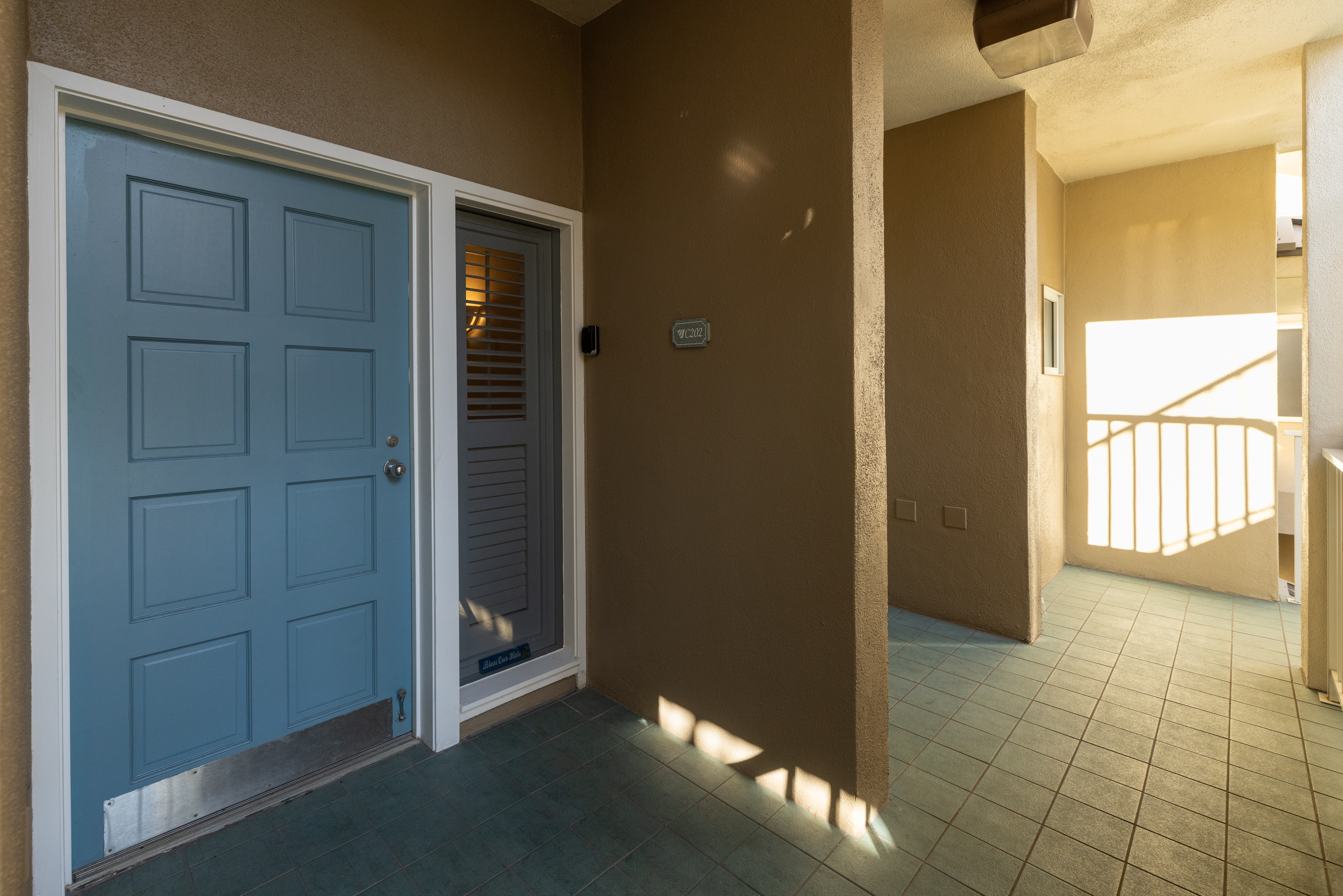 69-1010 Keana Place, Unit C202 Waikoloa, HI 96738 - Photo 25 of 30 wooden floor in an empty room and a bathroom