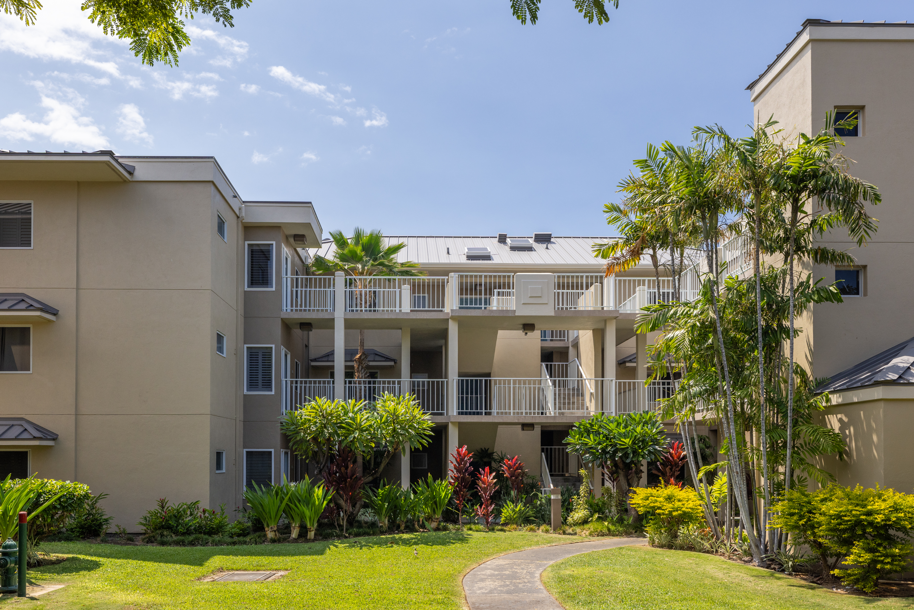 69-1010 Keana Place, Unit C202 Waikoloa, HI 96738 - Photo 26 of 30 a view of a house with swimming pool and garden