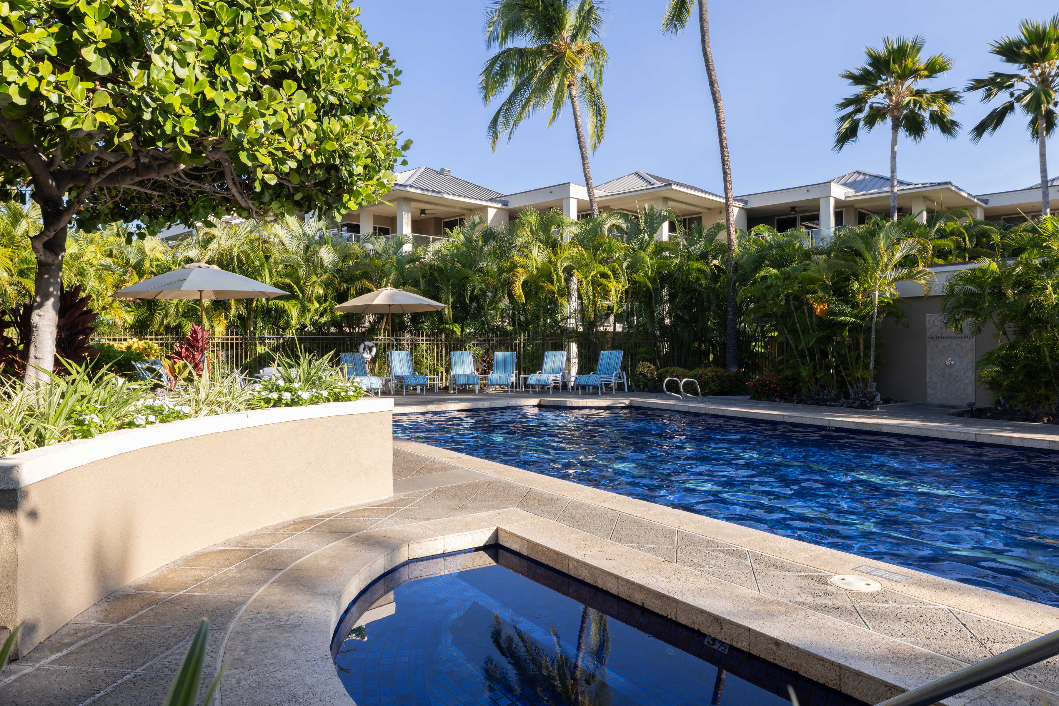 69-1010 Keana Place, Unit C202 Waikoloa, HI 96738 - Photo 27 of 30 a view of a swimming pool with a patio