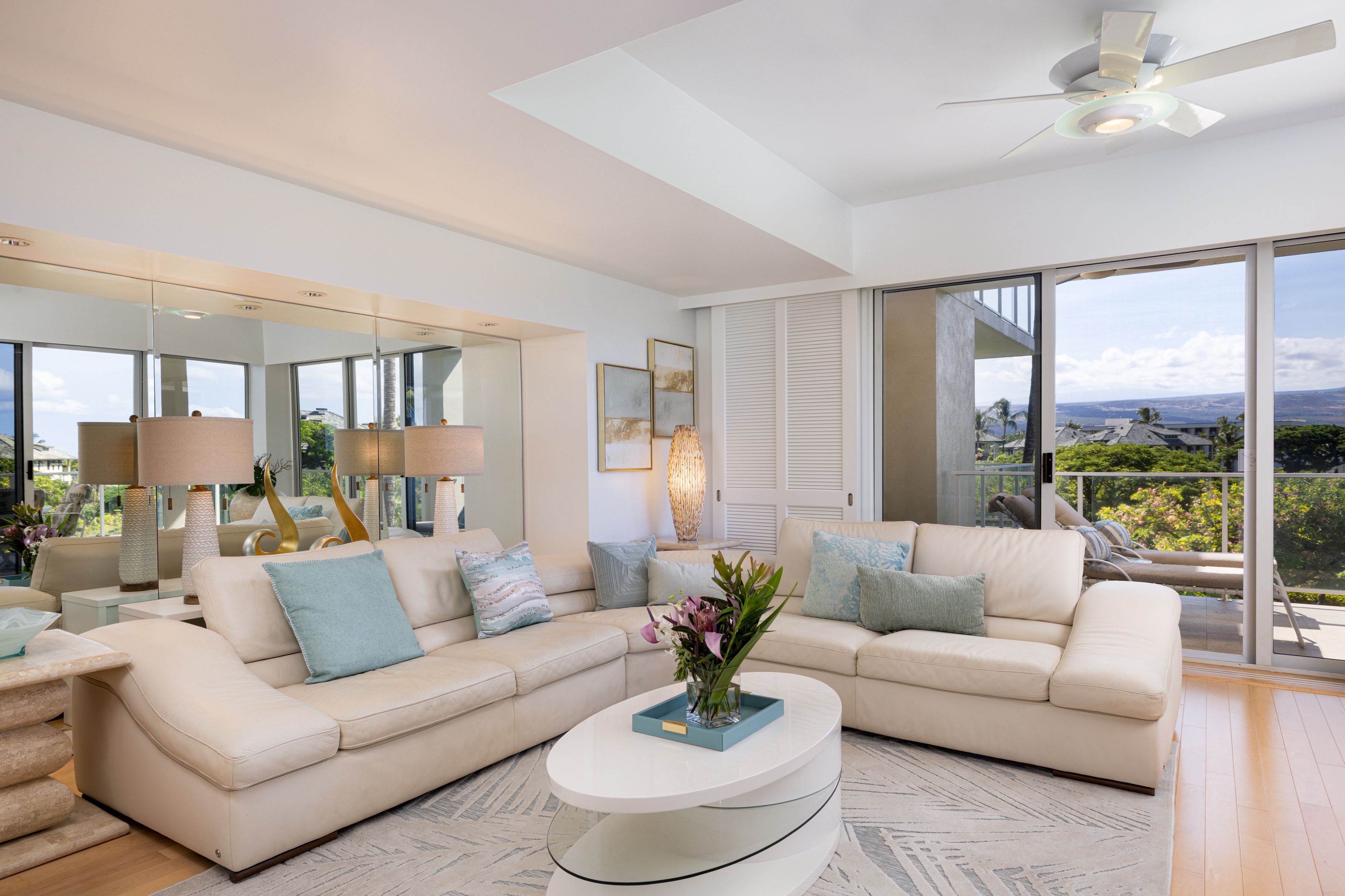 69-1010 Keana Place, Unit C202 Waikoloa, HI 96738 - Photo 5 of 30 a living room with furniture and a large window