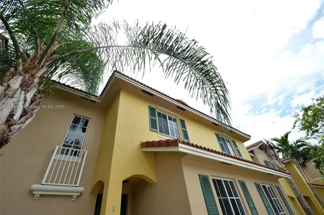 a view of a house with a roof deck