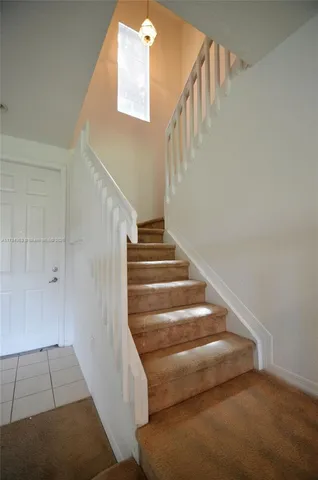 a view of an entryway with staircase