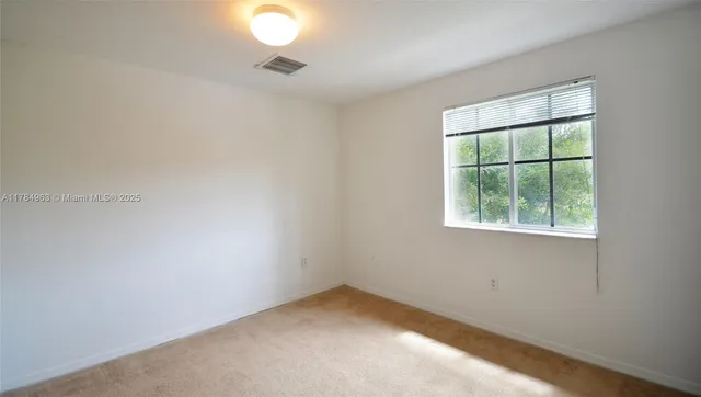 an empty room with a window