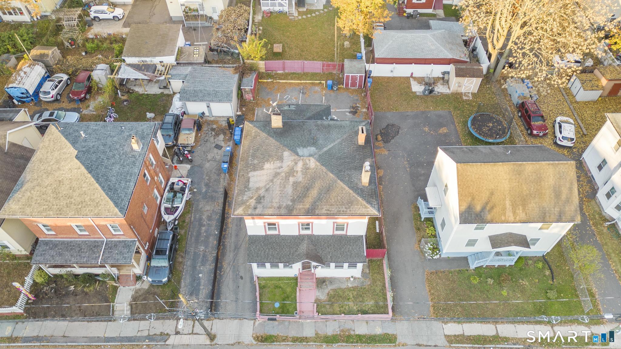 87 Amity Street Hartford, CT 06106 - Photo 3 of 38 an aerial view of houses with a street