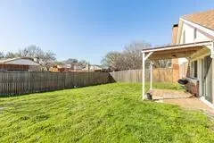 a view of a backyard with a garden