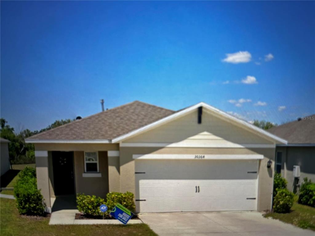 30364 Armenia Road Leesburg, FL 34748 - Photo 1 of 1 a front view of a house with a yard