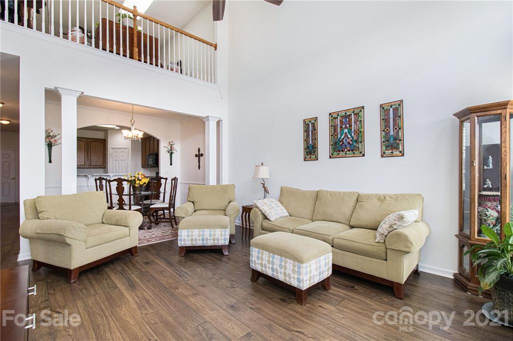 287 Garnet Court Fort Mill, SC 29708 - Photo 11 of 30 a living room with furniture and a wooden floor