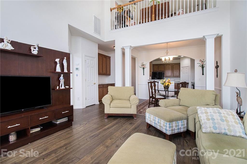 287 Garnet Court Fort Mill, SC 29708 - Photo 12 of 30 a living room with furniture and a flat screen tv
