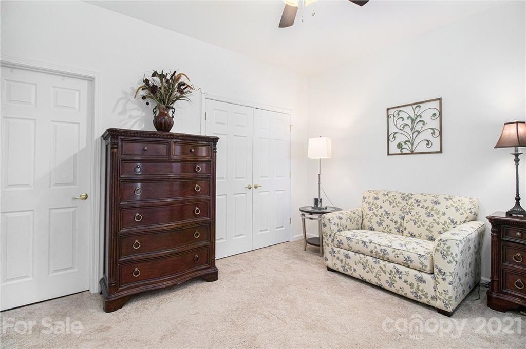 287 Garnet Court Fort Mill, SC 29708 - Photo 18 of 30 a living room with furniture and a dresser