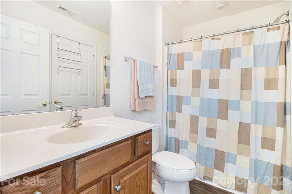 287 Garnet Court Fort Mill, SC 29708 - Photo 24 of 30 a bathroom with a sink toilet and shower