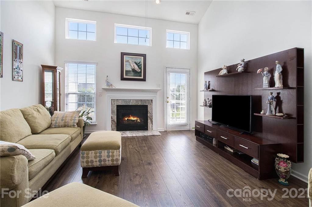 287 Garnet Court Fort Mill, SC 29708 - Photo 9 of 30 a living room with furniture and a flat screen tv