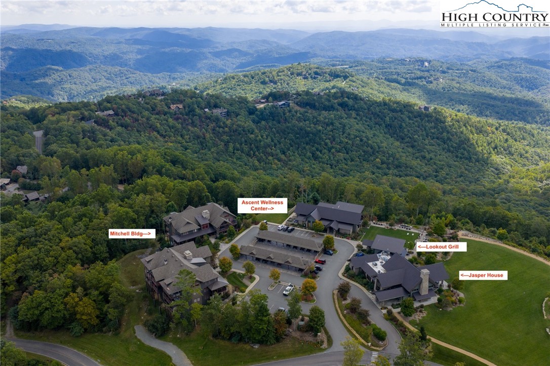 188 Ramblestone Terrace, Unit 101 Boone, NC 28607 - Photo 32 of 48 an aerial view of a house with a yard