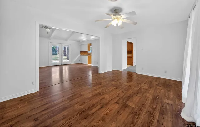 a kitchen with a sink cabinets and window