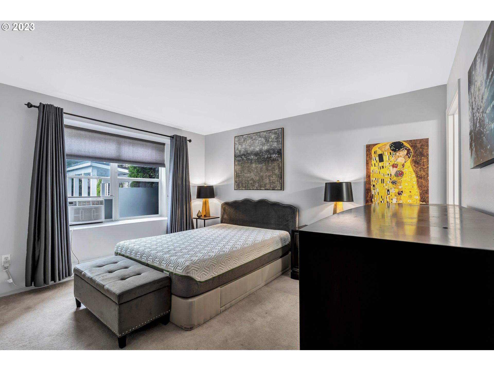 4694 West Powell Boulevard, Unit 139 Gresham, OR 97030 - Photo 15 of 29 a living room with furniture and a flat screen tv