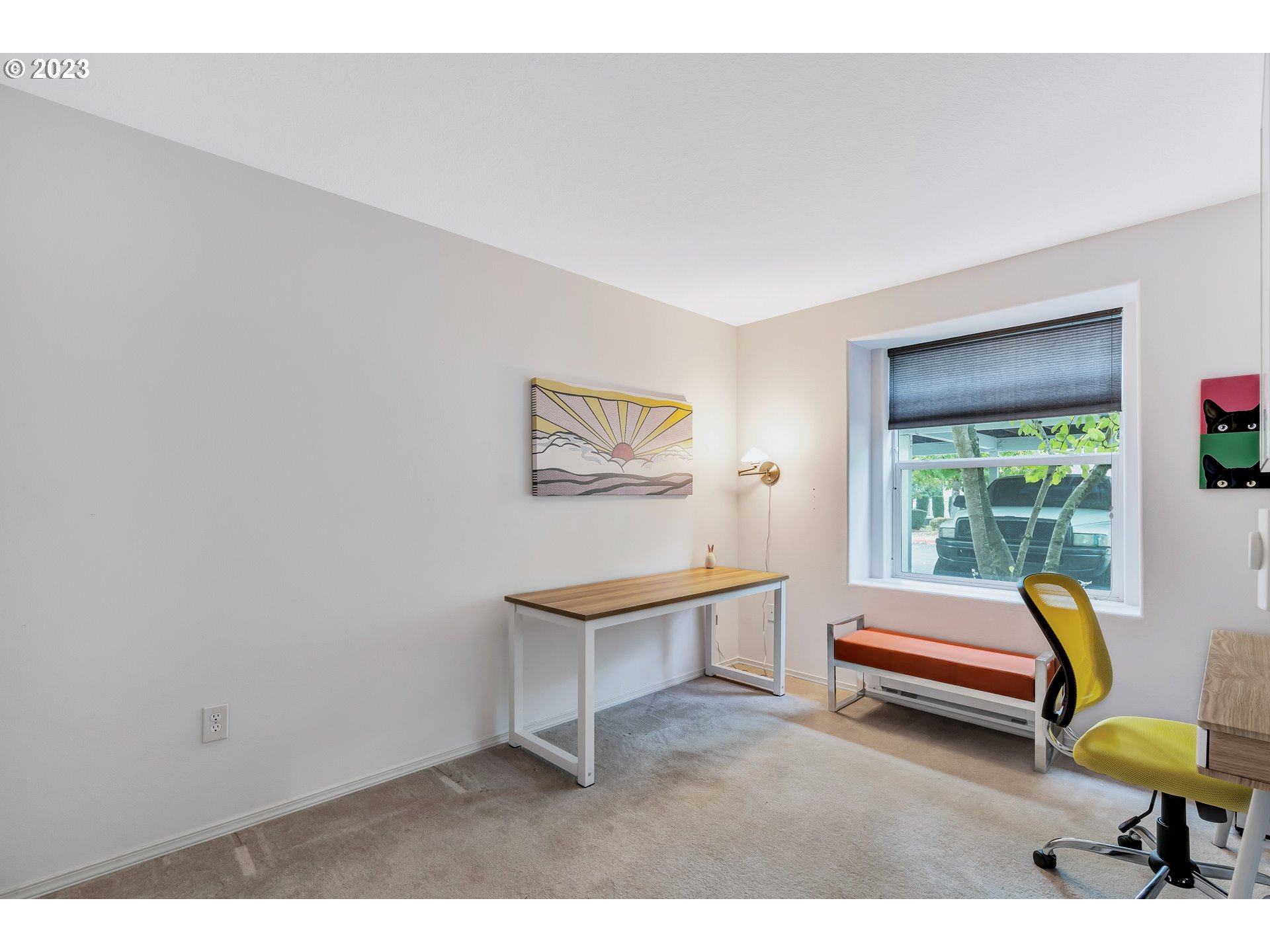 4694 West Powell Boulevard, Unit 139 Gresham, OR 97030 - Photo 19 of 29 a bedroom with a bed and a window