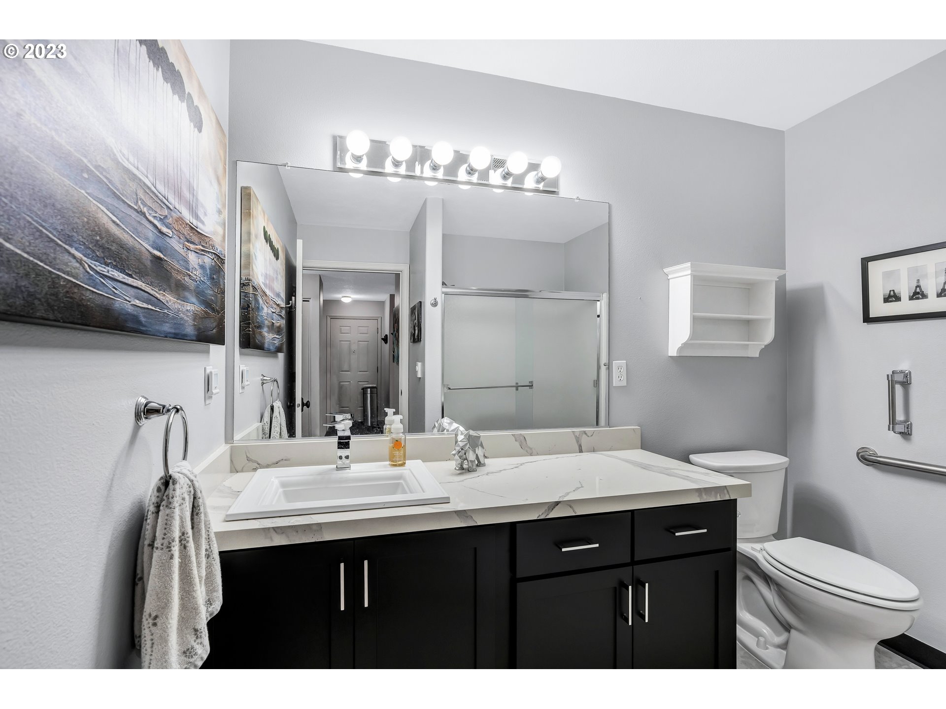 4694 West Powell Boulevard, Unit 139 Gresham, OR 97030 - Photo 21 of 29 a bathroom with a sink double vanity and a mirror