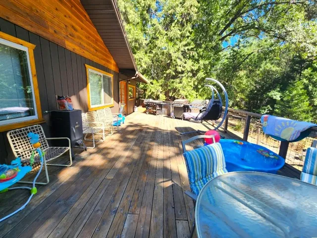 a view of a backyard of the house