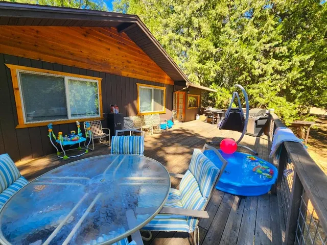 a view of a backyard of the house