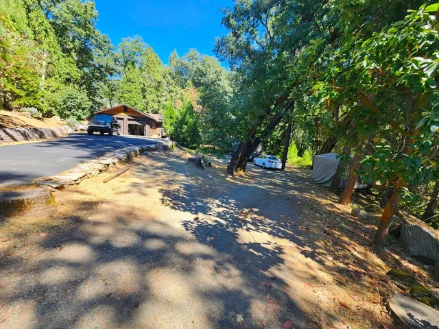 a room with lots of furniture and wooden floor