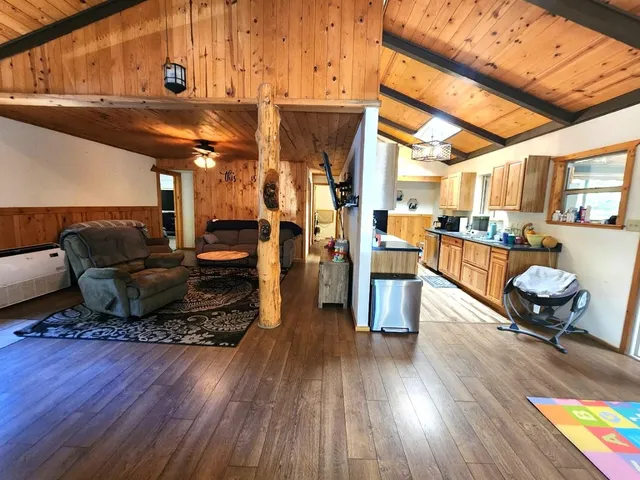 a kitchen with counter space appliances and windows
