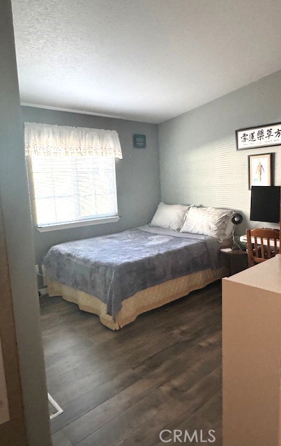 7271 Katella Avenue, Unit 99 Stanton, CA 90680 - Photo 11 of 15 a bedroom with a bed and window