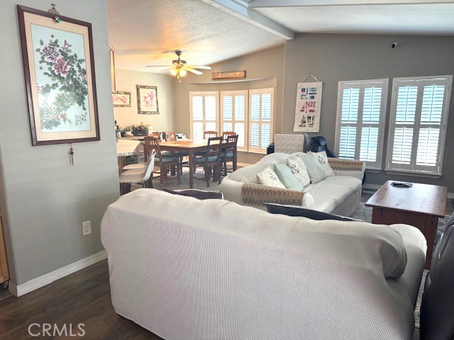7271 Katella Avenue, Unit 99 Stanton, CA 90680 - Photo 15 of 15 a living room with furniture and a large window